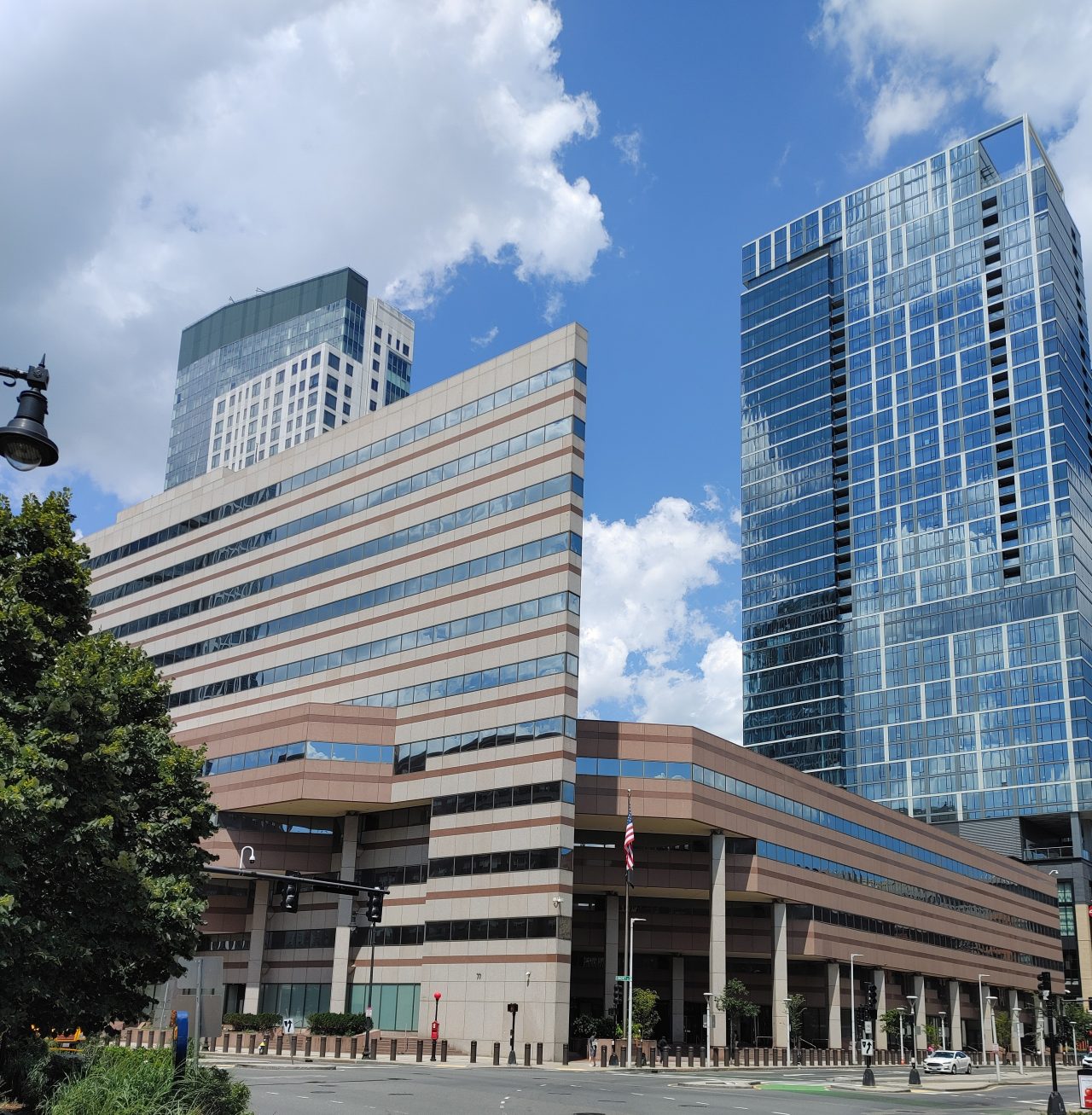 The Boston Passport Agency is an angular brown office building with horizontal windows.