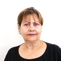 Photo of a woman with red eye from camera flash. 