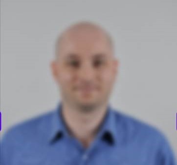 A blurry photo of a man.